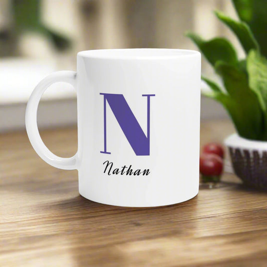 White mug with Blue initial and name