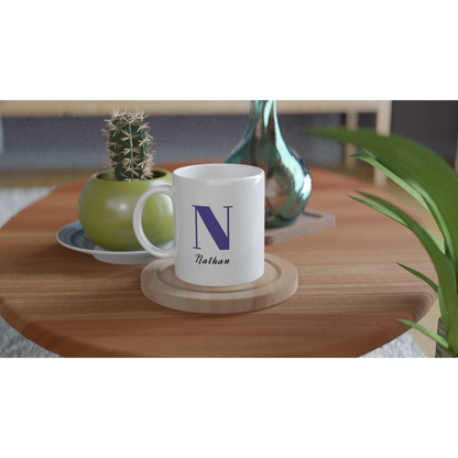 White mug with Blue initial and name