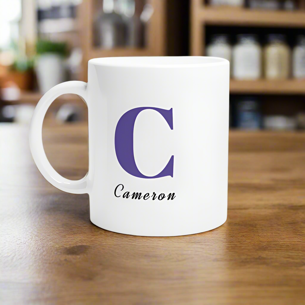 White mug with Blue initial and name