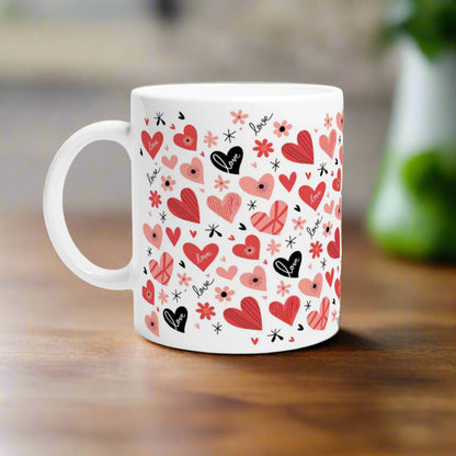 White coffee mug with pink and red hearts  and floral design