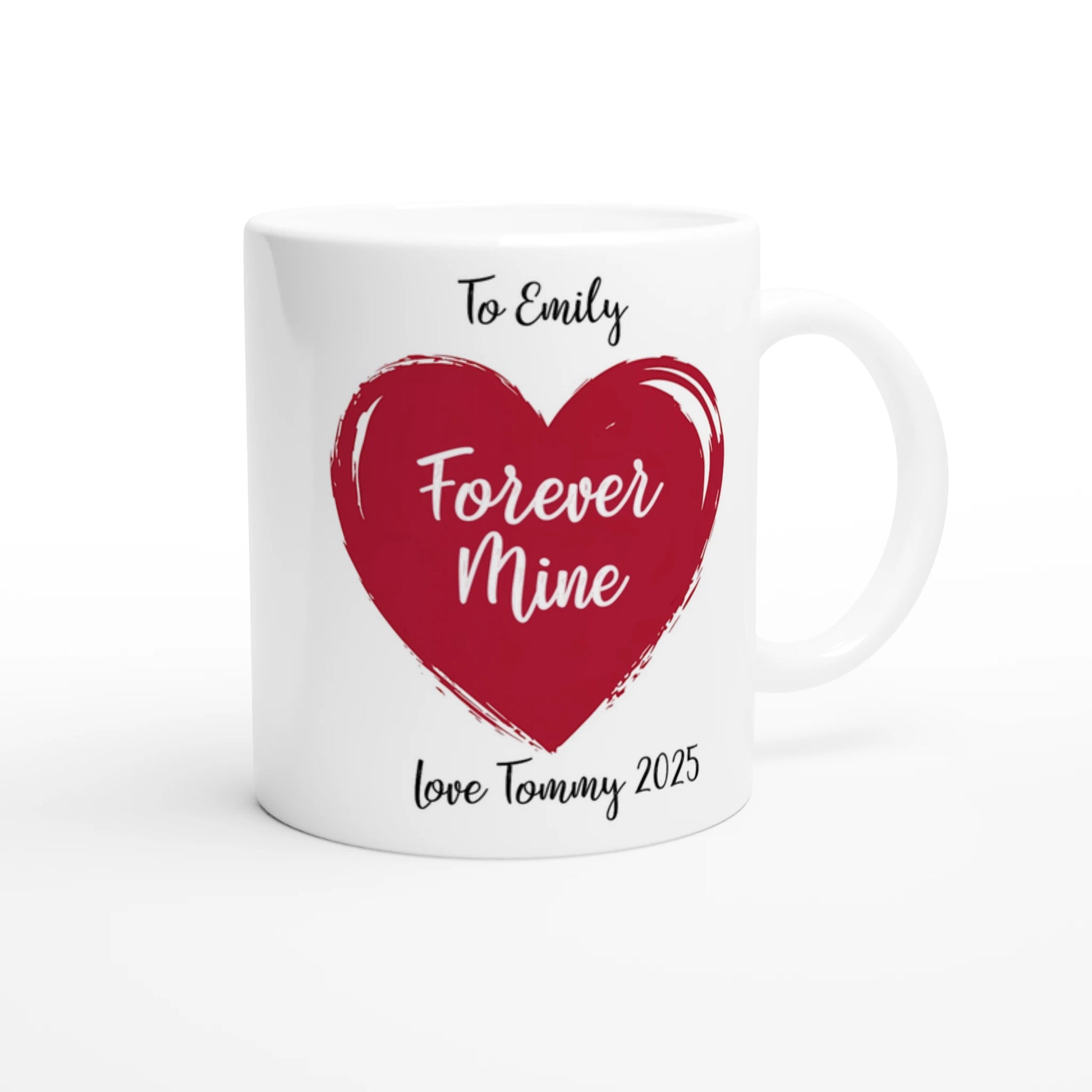 Coffee mug with red heart and text "To Emily forever mine, love Tommy 2025"